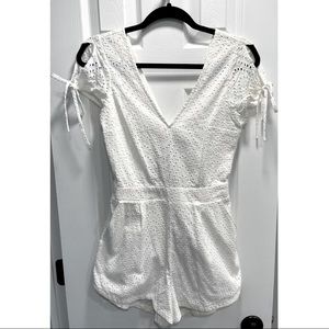Beautiful, only worn once, white crochet style romper from Express.